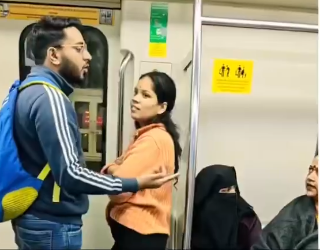 Viral Metro fight: Female passenger quarrels with man as latter hugs partner; netizens reactions to blow your mind!
